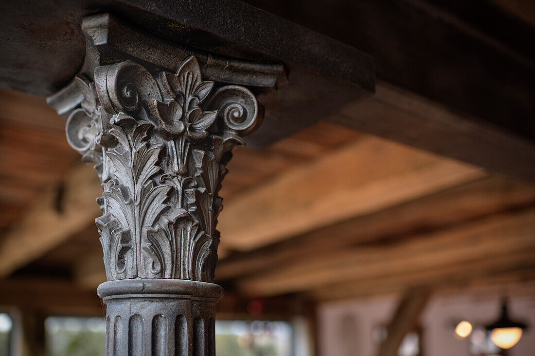 Magnificently designed cast-iron column in old schoolhouse, Steinheim am Albuch, Heidenheim district, Baden-Wuerttemberg, Germany, Europe
