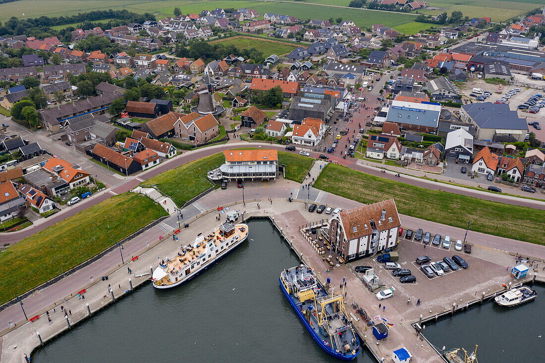 Aerial view of fishing boats in the harbor and town, Oudeschild, Texel, West Frisian Islands, Friesland, The Netherlands, Europe