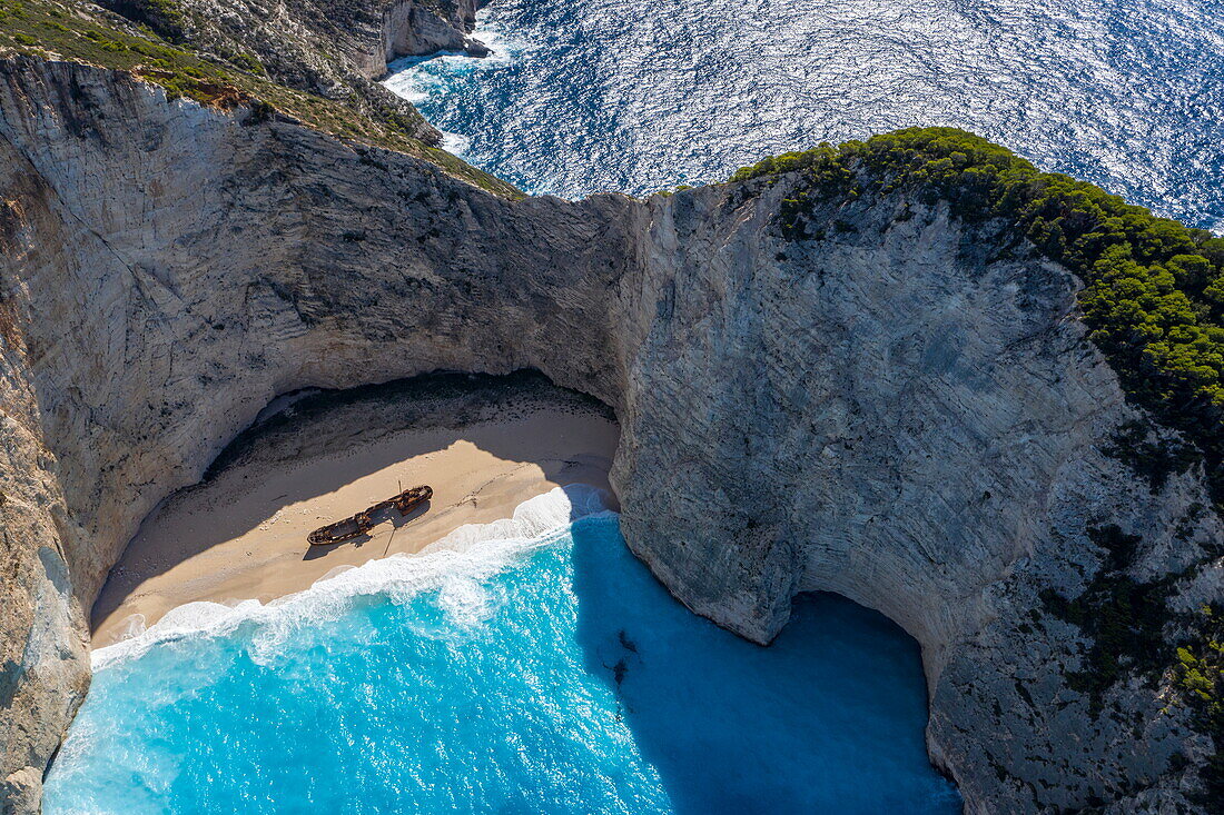 Aerial view of the rusting ship MV Panagiotis that ran aground in 1980, Shipwreck Beach, Zakynthos, Ionian Islands, Greece, Europe