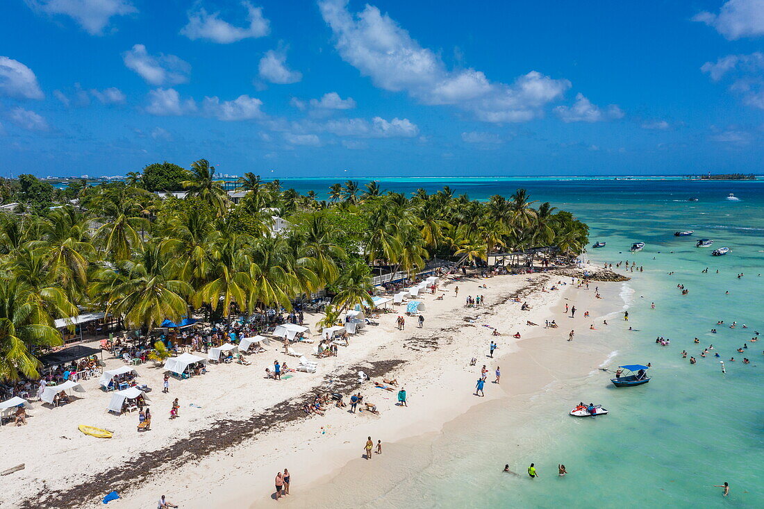 Aerial view of people swimming and enjoying the beach on San Andres Island, Saint Andréws Archipelago, Colombia, Central America