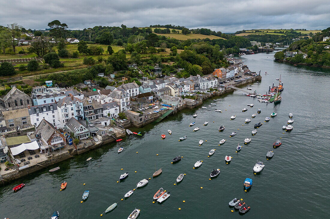 Aerial view of fishing boats in Fowey Harbor and town, Fowey, Cornwall, England, United Kingdom, Europe