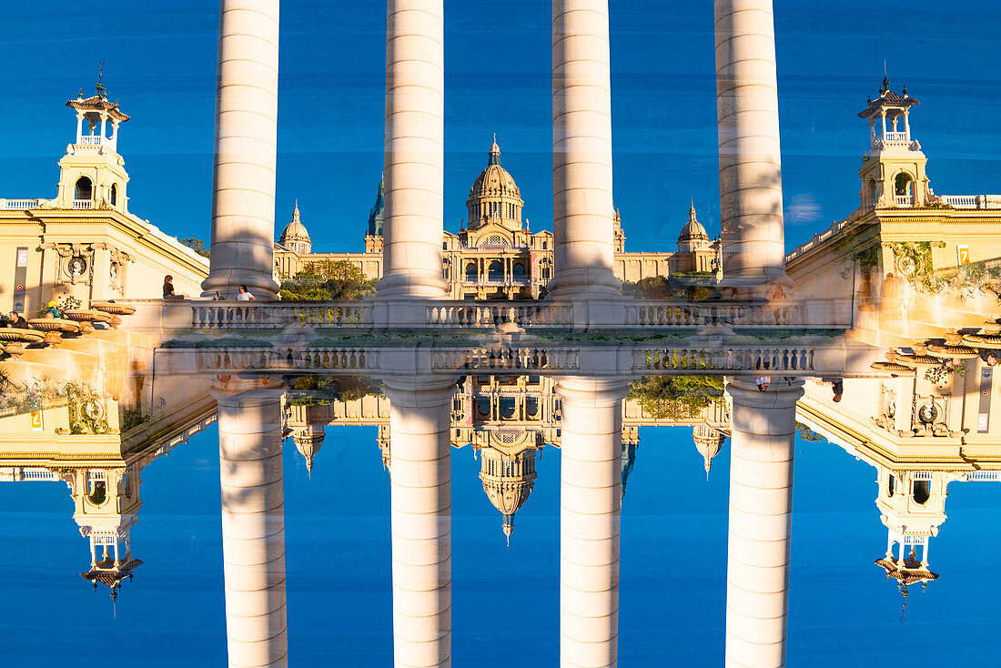 Double exposure photograph of the four columns statue on the Plaça de Josep Puig i Cadafalch near the Font Majica in Barcelona