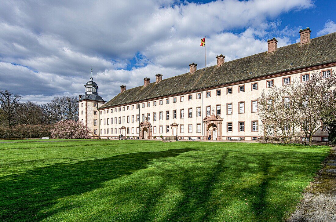 Corvey Castle under a cloudy sunny sky, Höxter, North Rhine-Westphalia, Germany