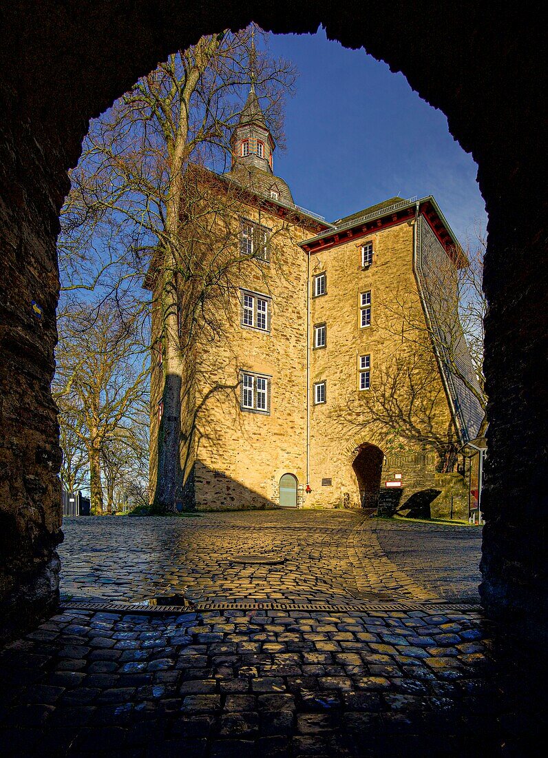 Upper Castle in Siegen in the evening light, view through the arch of the main entrance, Siegen, North Rhine-Westphalia, Germany