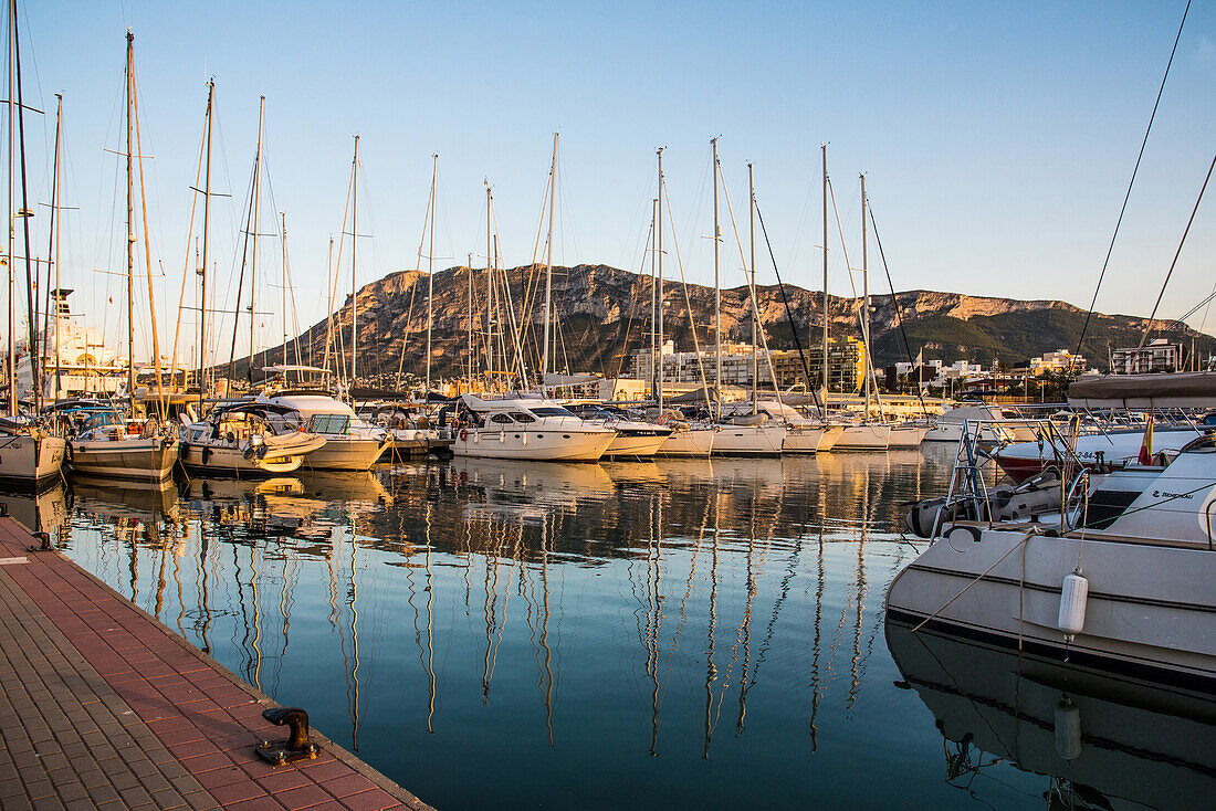 Denia, Costa Blanca, port with local mountain Montgo, in the evening, Spain