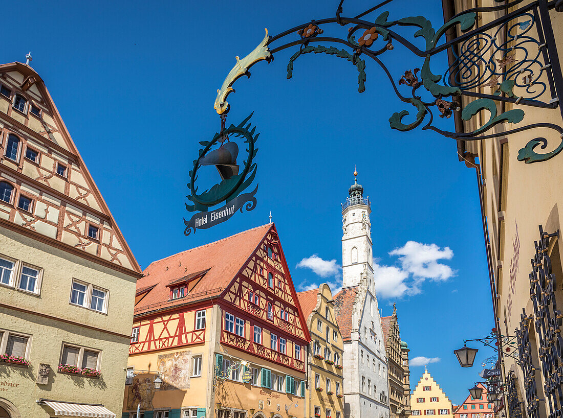 Historic houses in Herrngasse and town hall tower, Rothenburg ob der Tauber, Middle Franconia, Bavaria, Germany