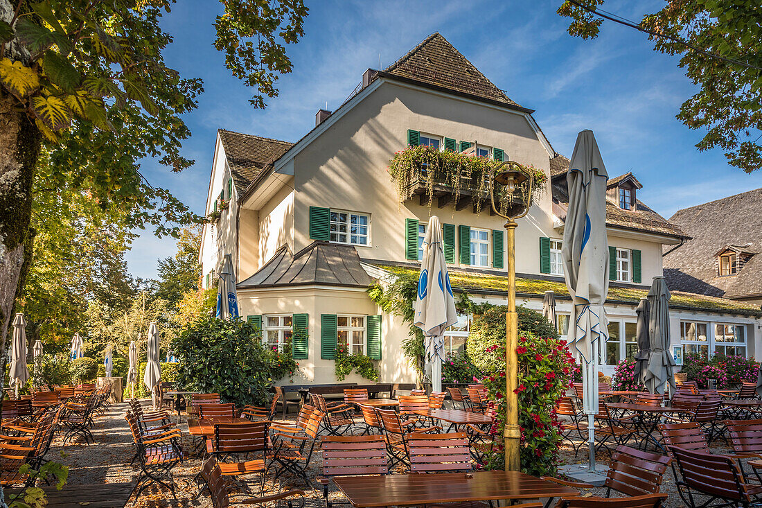 Beer garden of the historical inn `Zur Linde` on the Fraueninsel in Lake Chiemsee, Upper Bavaria, Bavaria, Germany
