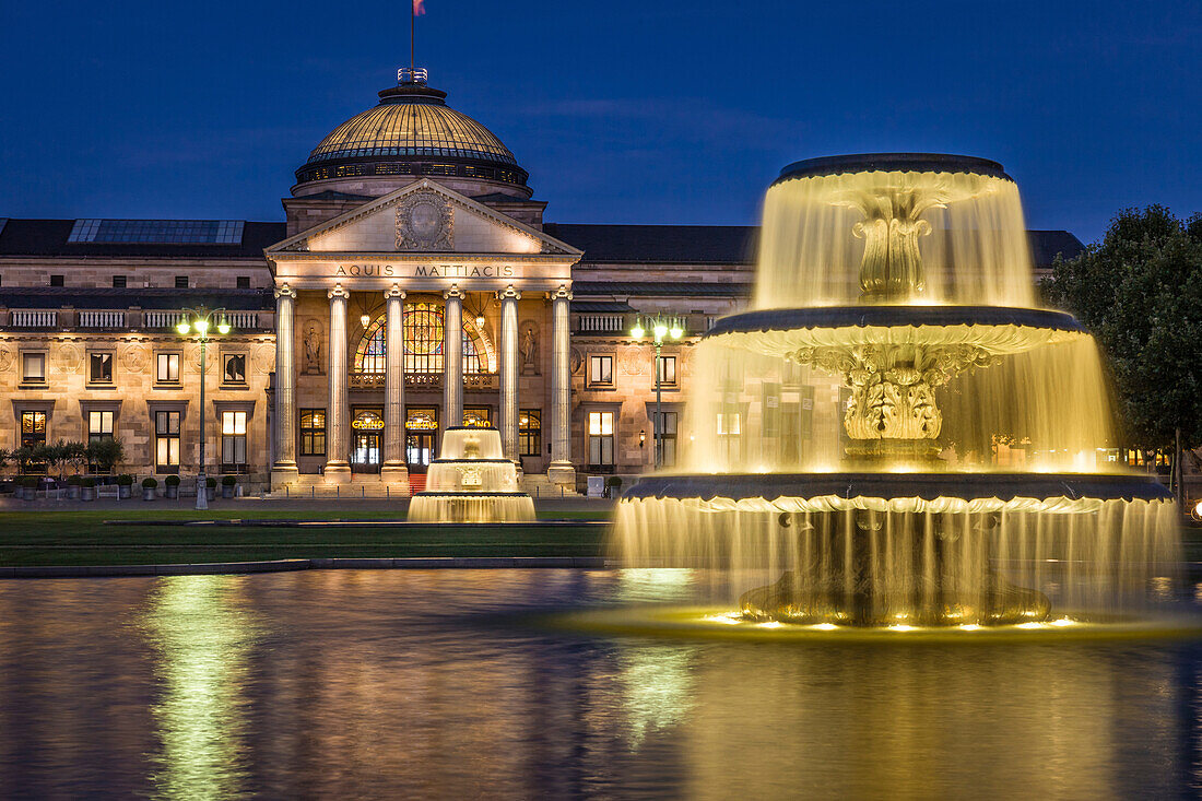 Kurhaus and fountain on the bowling green at night, Wiesbaden, Hesse, Germany