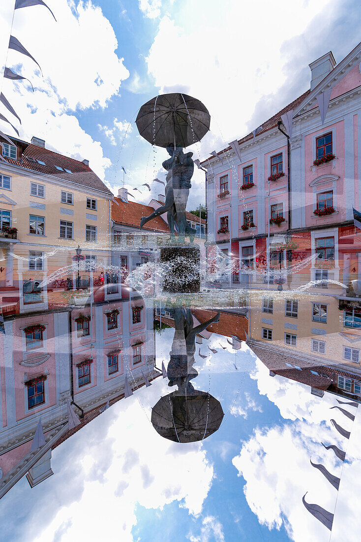Double exposure of the town square of Tartu with the statue of the kissing students, Estonia.