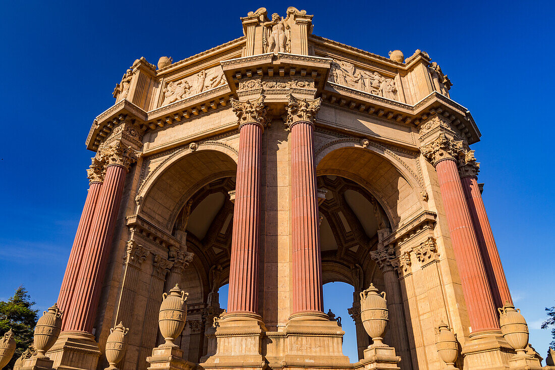 The grand dome, statues and decorations of the Palace of Fine Arts in the Marina District in San Francisco, Bay Area, California, United States