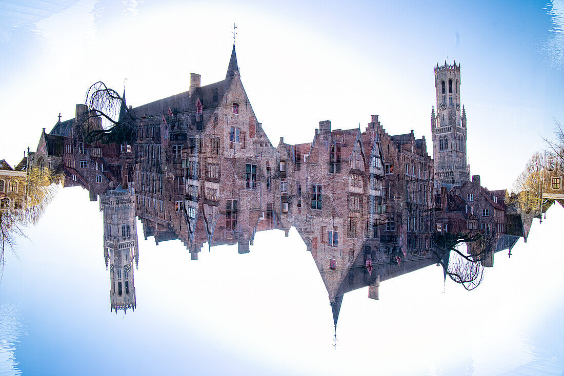 Double exposure of the Belfry tower in Bruges, Belgium as seen from popular tourist spot 'Den Dijver'.