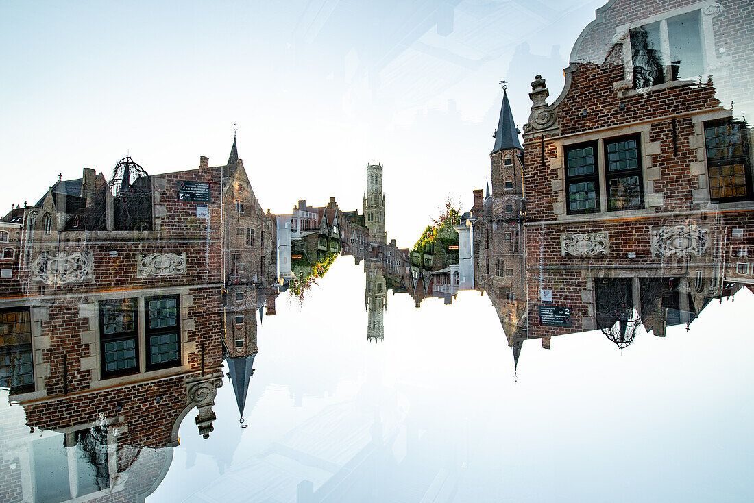 Double exposure of the Belfry tower in Bruges, Belgium as seen from popular tourist spot 'Den Dijver'.