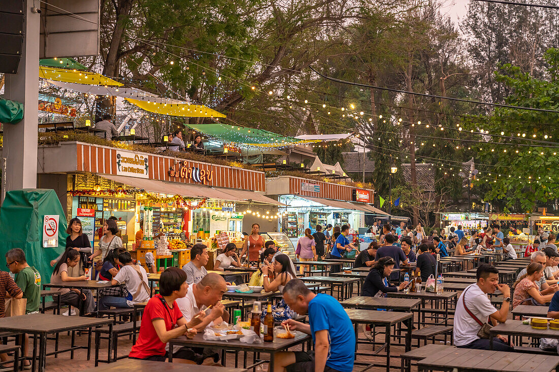 Dining tables at the night market in Luang Prabang, Laos, Asia