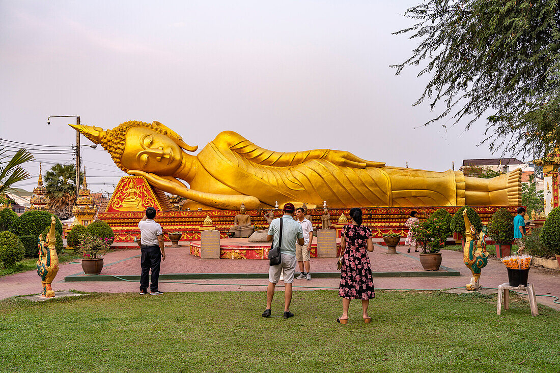 Huge reclining Buddha at Wat That Luang Neua temple in the capital Vientiane, Laos, Asia