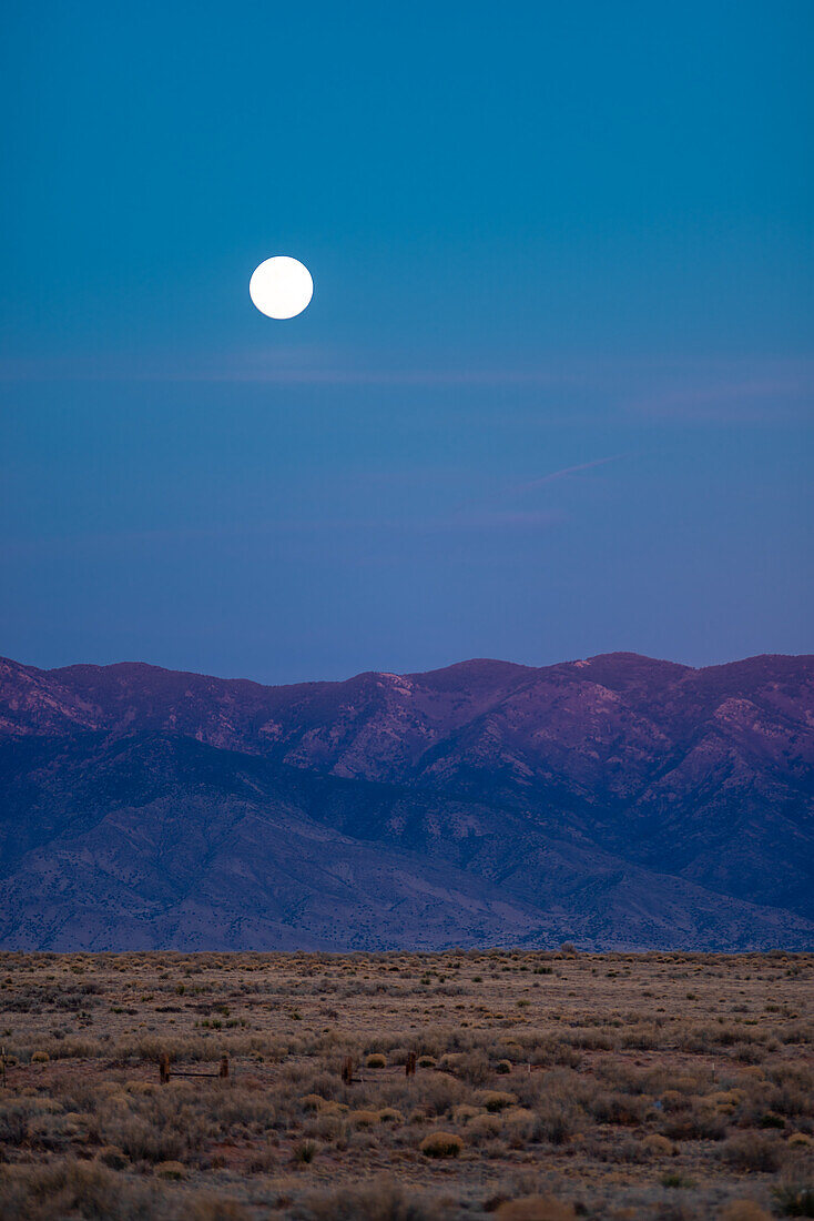 Full moon rising over the New Mexico desert.