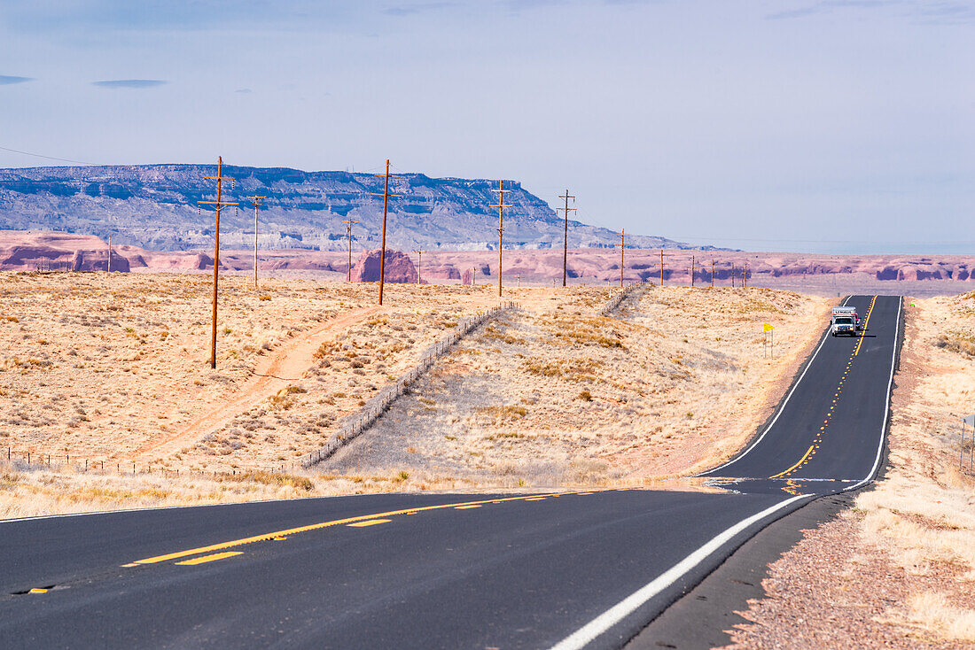 Road with U-haul truck in the Arizona desert.