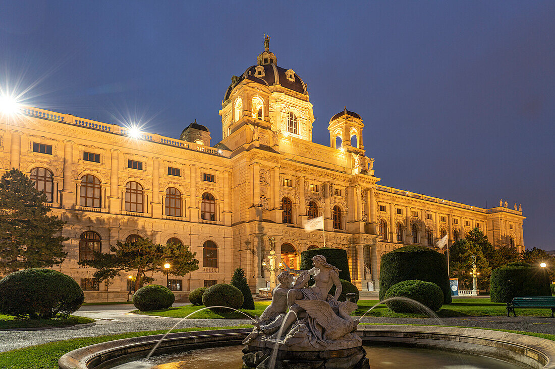 Fountain on Maria-Theresien-Platz and the Natural History Museum in Vienna at dusk, Austria, Europe