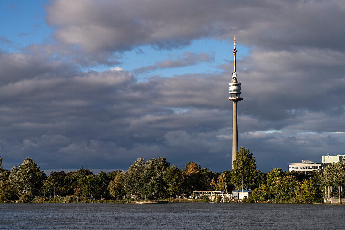 Danube river bank and Danube Tower in Vienna, Austria, Europe