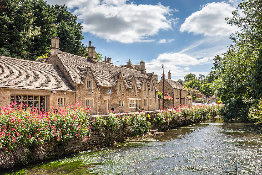 Old Cottages by the River Coln in Bibury, Cotswolds, Gloucestershire, England