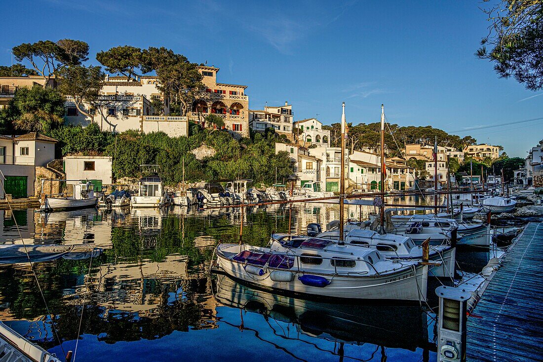 Boats, fishermen's houses and villas in Cala Figuera, Santanyí municipality, Mallorca, Spain