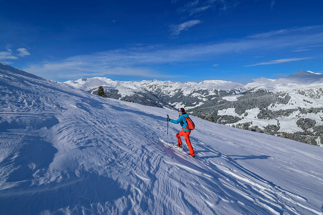 Woman on ski tour ascending to Schönbichl, Schönbichl, Gerlos, Zillertal Alps, Tyrol, Austria