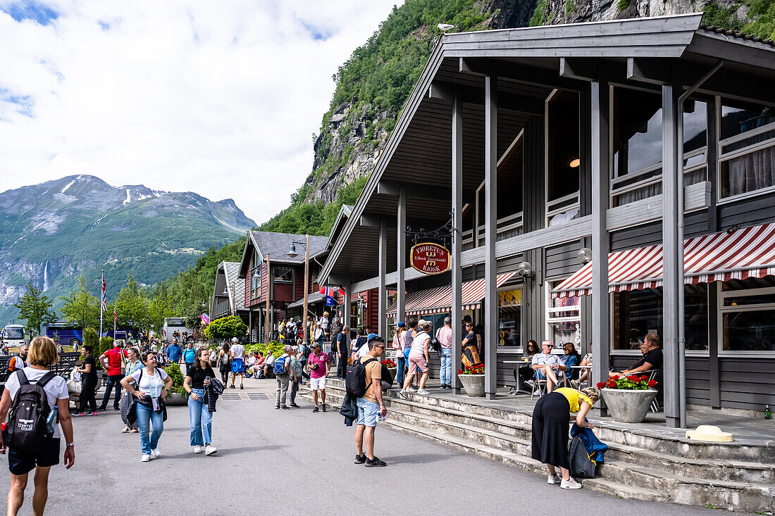 Tourists in front of souvenir shops in Geiranger, Unesco World Heritage Site, Fjord, Moere and Romsdal