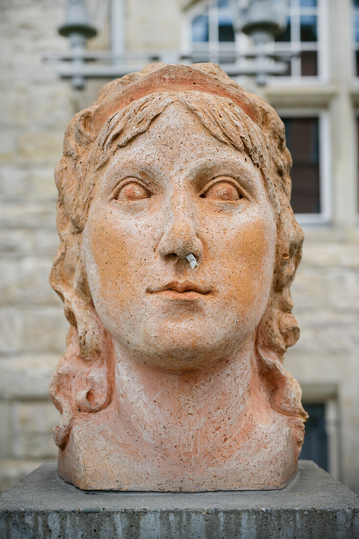 Cigarette was put in portrait plastic, Rudolstadt, district of Saalfeld-Rudolstadt, Thuringia, Germany, Europe