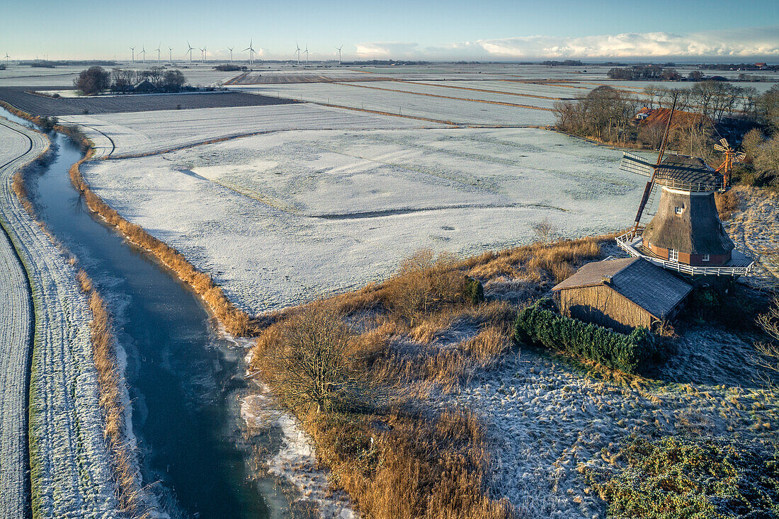 The Stumpenser Mill and fields at the Horumer Tief in winter, Wangerland, Friesland, Lower Saxony, Germany, Europe
