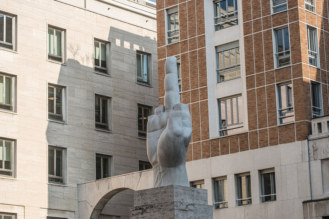 Maurizio Cattelan L.O.V.E. sculpture, piazza della Borsa, Milan, Italy