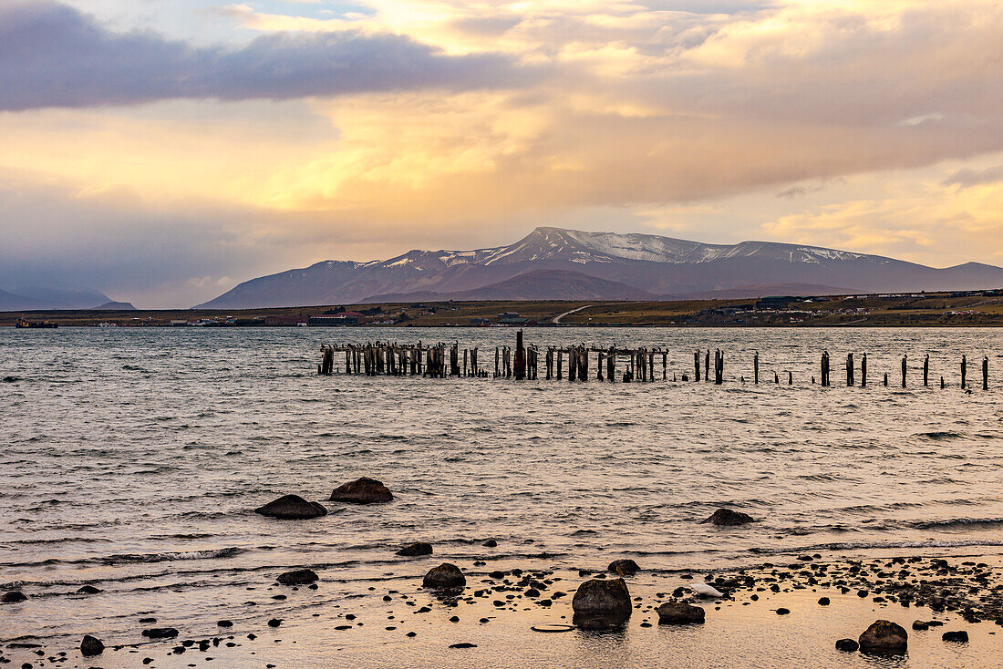 Evening mood with clouds at the old jetty of Puerto Natales on the Ultima Esperanza Fjord in Southern Chile, Patagonia, South America