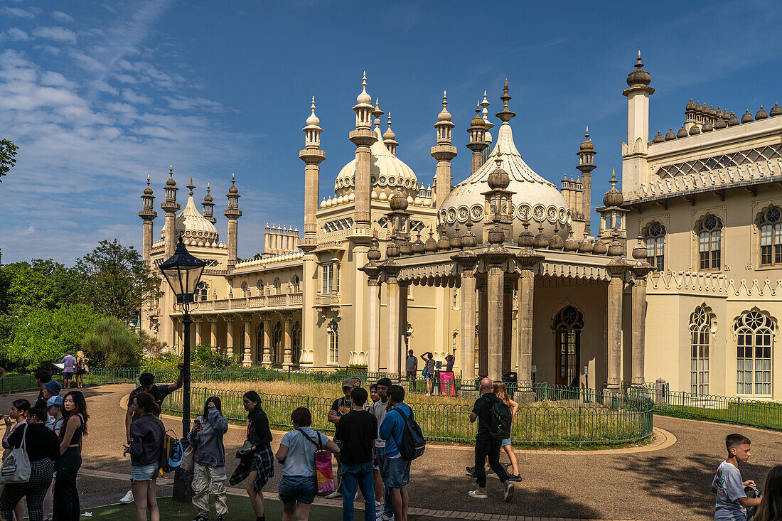 Students in front of the Royal Pavilion in the seaside resort of Brighton, England, United Kingdom, Europe