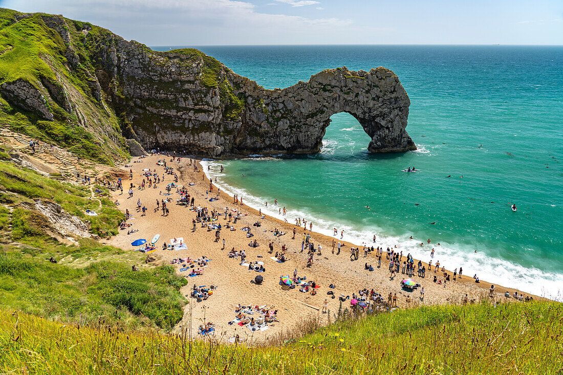 The Durdle Door natural rock bridge and beach on the Jurassic Coast UNESCO World Heritage Site, England, United Kingdom, Europe