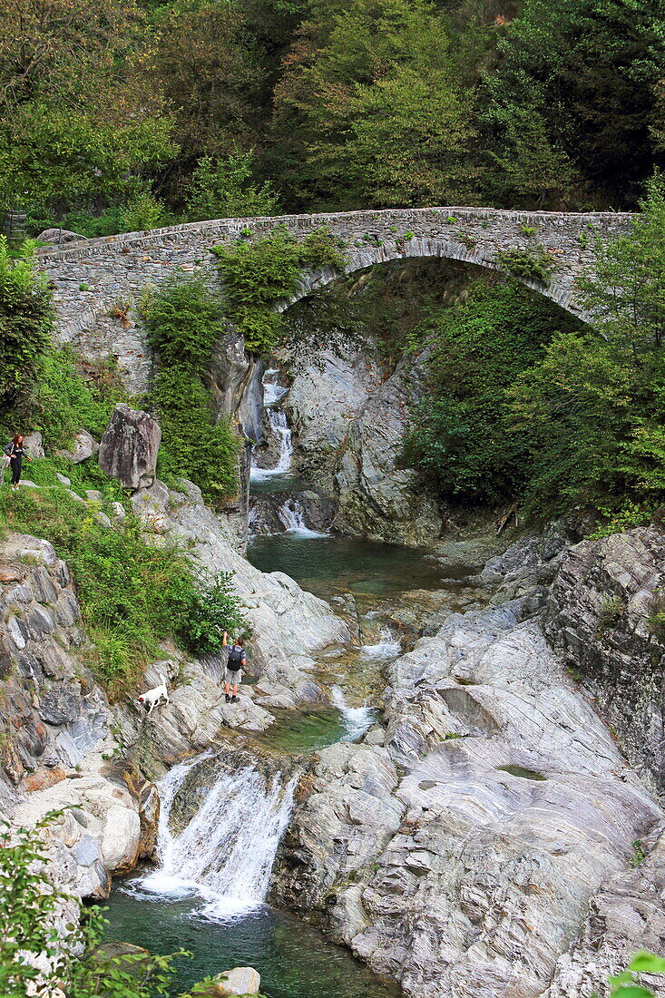 Old stone bridge and Crotto Dangri, Livo near Gravedona, Lombardy, Italy