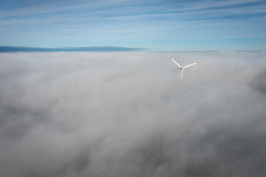 Wind turbine protrudes from the sea of fog near Bermaringen, Blaustein, Alb-Donau district, Swabian Jura, Baden-Wuerttemberg, Germany, Europe