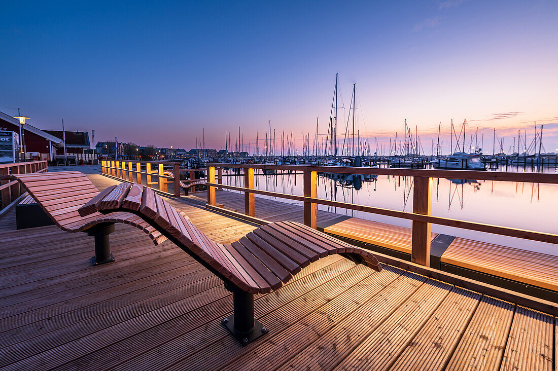 Wooden sofa on the Marina viewing platform, view of Heiligenhafen in the morning light, harbour, Baltic Sea, Ostholstein, Schleswig-Holstein, Germany