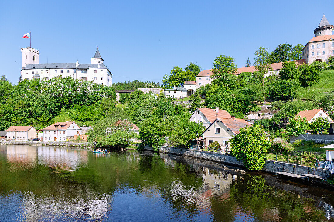 Rožmberk nad Vltavou with Rožmberk Castle and canoe on the Vltava River in South Bohemia in the Czech Republic