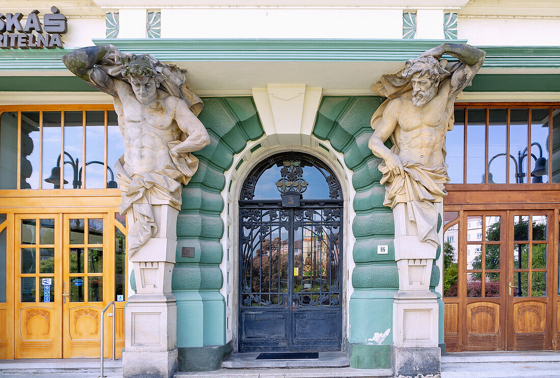 Art Nouveau portal with atlases of the Česká spořitelna at Hlavní náměstí in Krnov in Moravian Silesia in the Czech Republic