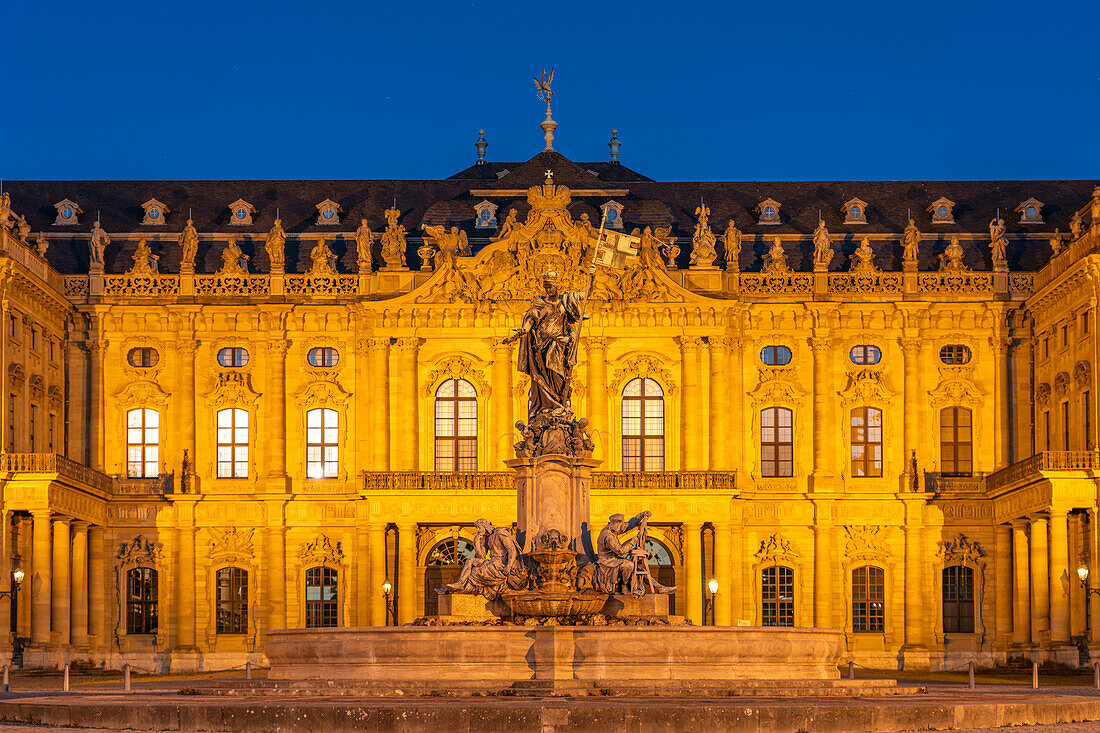 Frankonia Fountain in front of the Würzburg Residence at dusk, Würzburg, Bavaria, Germany