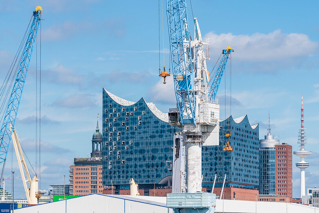 Elbphilharmonie concert hall, framed by Michel and television tower, Hafencity, Hamburg, Germany