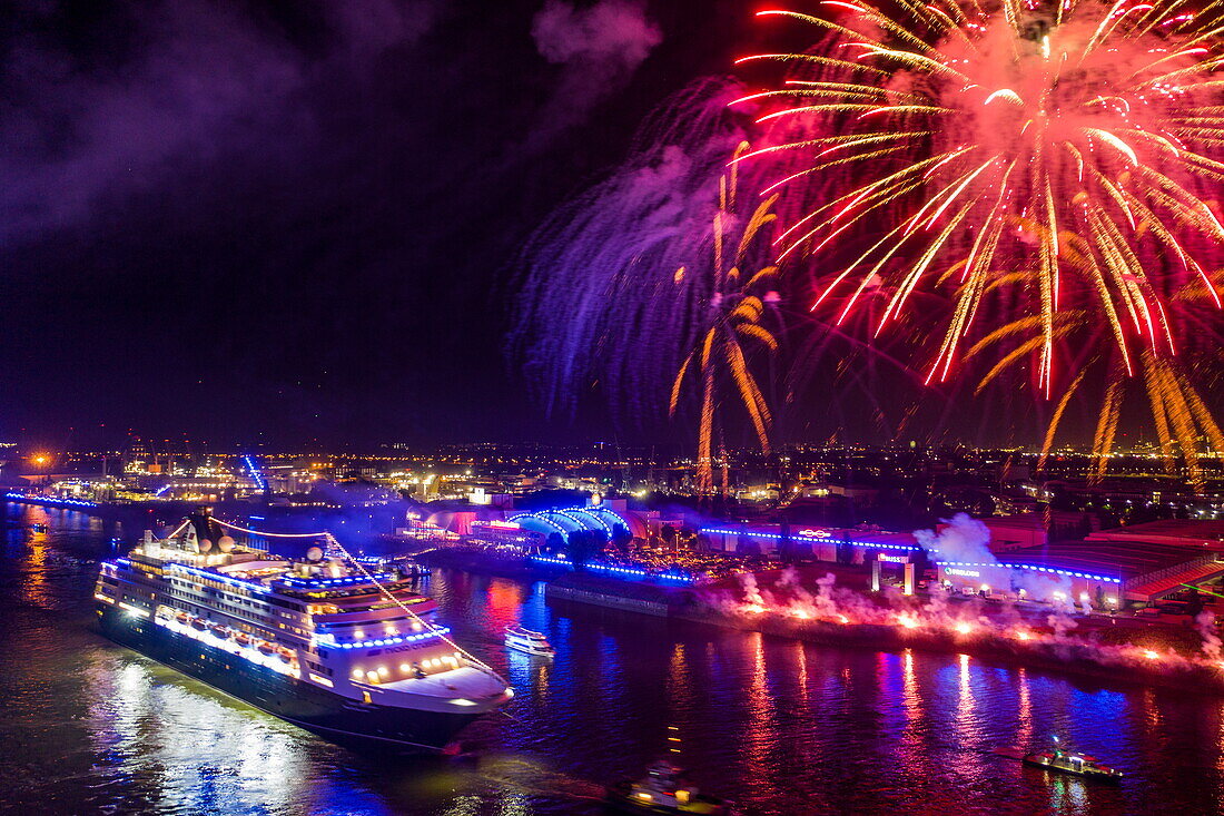 Aerial view of fireworks over the cruise ship Vasco da Gama (nicko cruises) during the departure parade of the Hamburg Cruise Days 2023 at night, Hamburg, Hamburg, Germany