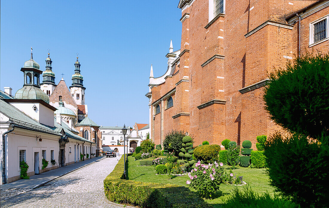 Garden and alley between St. Peter and Paul Church (kościół św. Piotra i Pawła) and St. Andrew's Church (Kościół św. Andrzeja) in the old town of Kraków in Poland