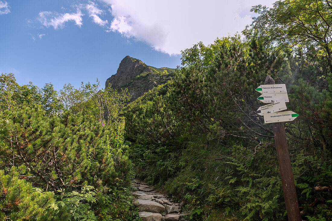 Signpost on the hiking trail to the Valley of the Five Polish Ponds (Dolina Pięciu Stawów Polskich) and Morskie Oko in the Tatra National Park (Tatrzański Park Narodowy) in Poland