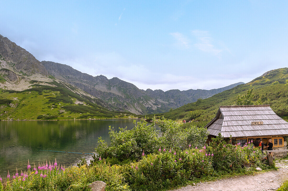 Lake Przedni Staw and grill room on the hiking trail to the Valley of the Five Polish Ponds (Dolina Pięciu Stawów Polskich) and Morskie Oko in the Tatra National Park (Tatrzański Park Narodowy) in Poland