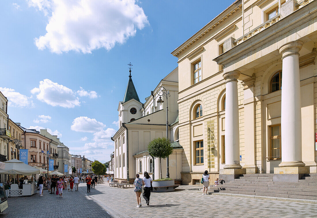 Neues Rathaus (Novy Ratusz) am Plac Łokietka und Krakauer Vorstadt (Krakowskie Przedmieście) mit Kirche vom Heiligen Geist (Kościół Świętego Ducha) in Lublin in der Wojewodschaft Lubelskie in Polen