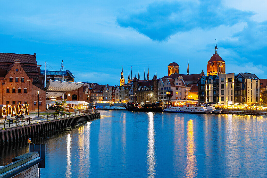 Bleihof Island (Ołowianka), Motława (Motlawa), Polish Baltic Philharmonic, St. John's Church and St. Mary's Church on the waterfront in Danzig (Gdańsk) in the Pomorskie Voivodeship of Poland