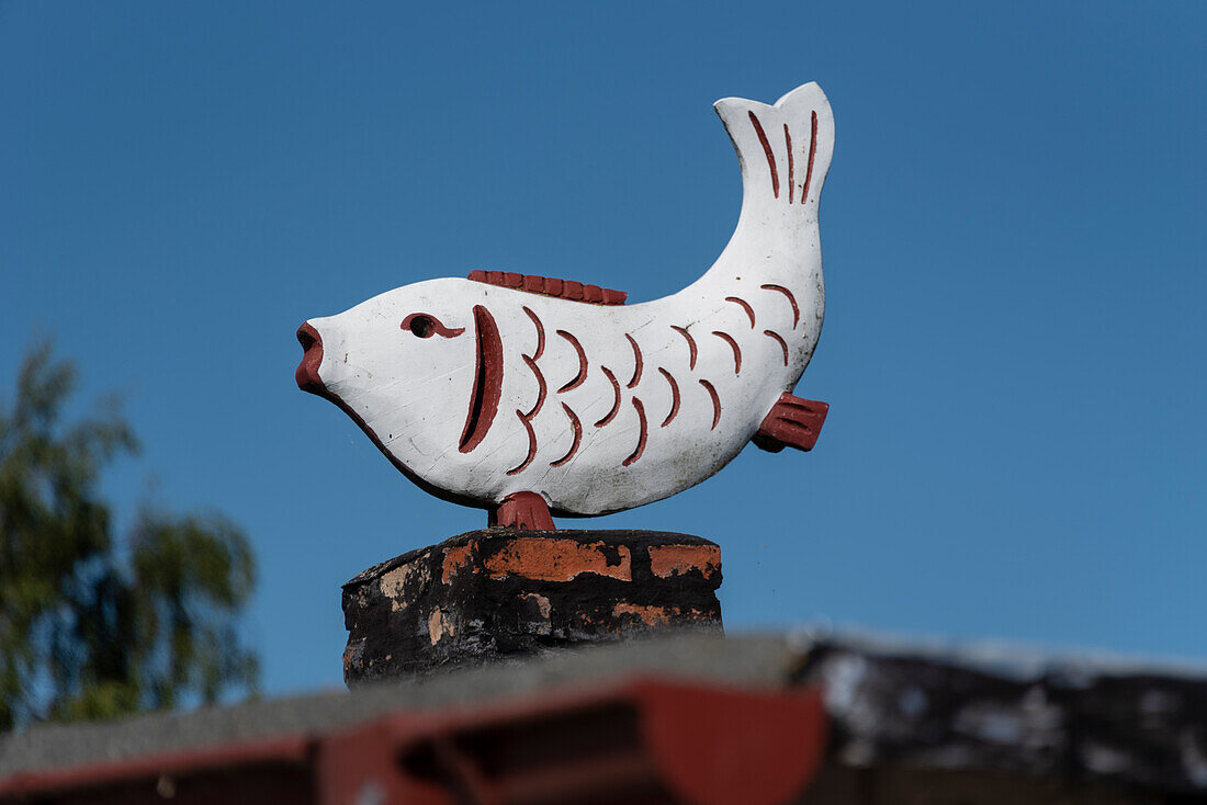 Wooden fish, stands on a fish smokehouse, Vitte, Hiddensee Island, Mecklenburg-West Pomerania, Germany