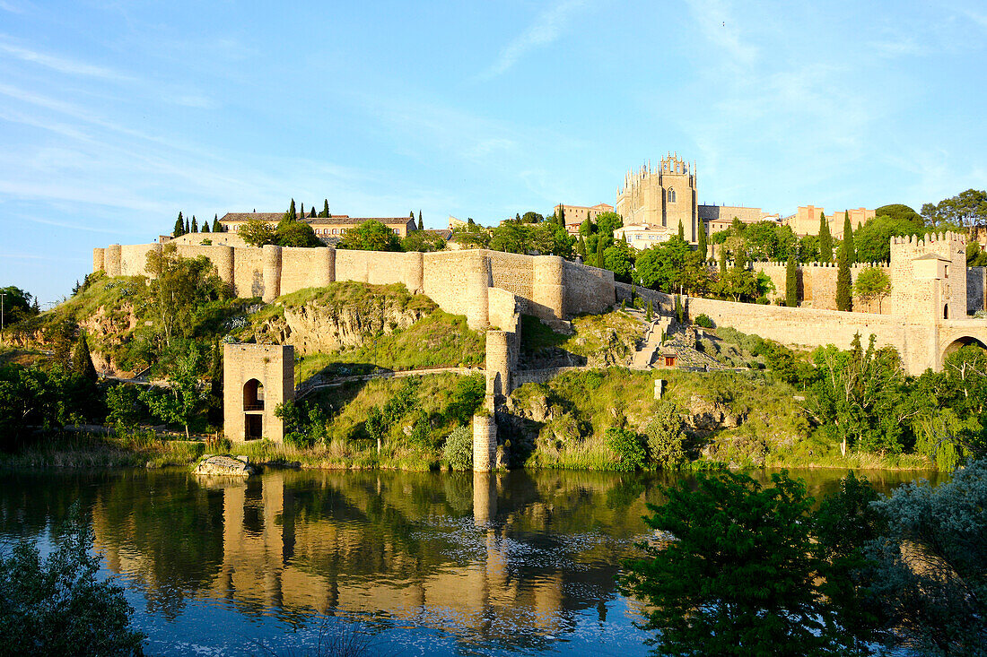 Toledo, Spain, historic west side, 12th-19th centuries Century, on the river Tajo. at evening