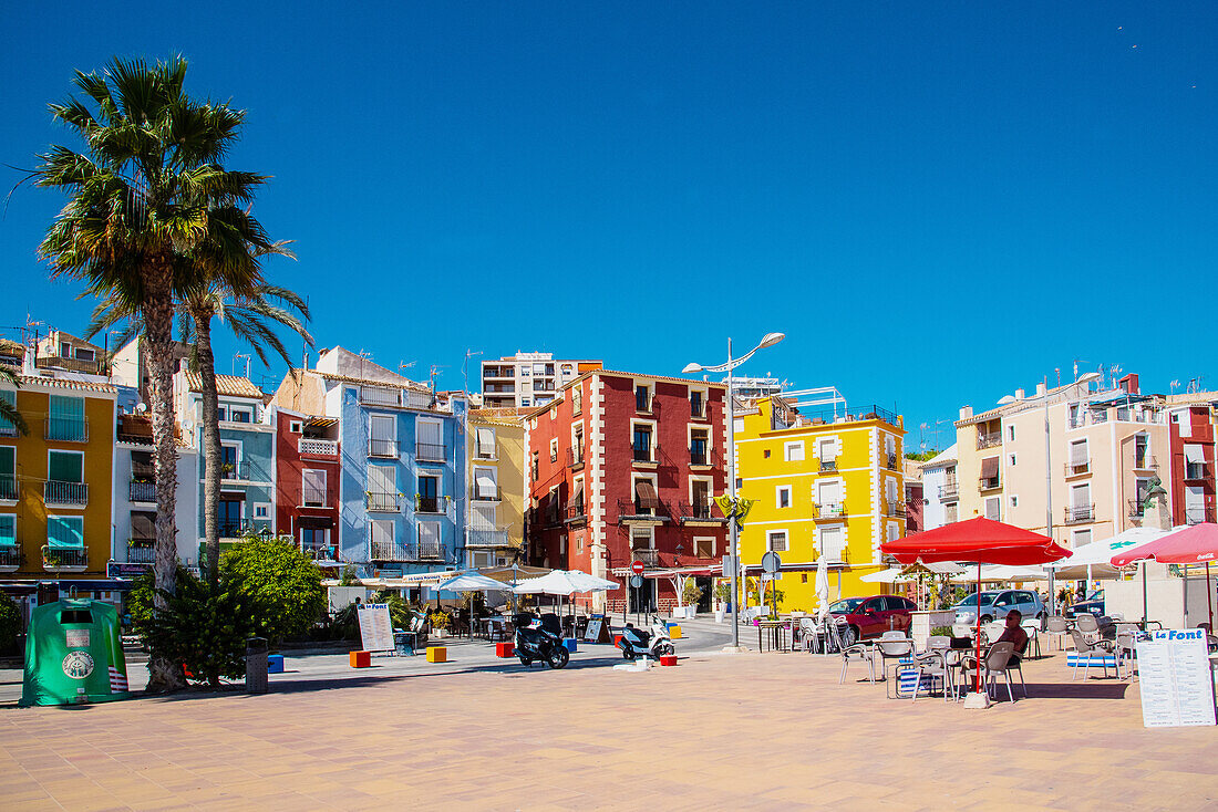 Vilayoyosa, the colorful town of the Costa Blanca, uniquely colourful, here in the hot afternoon, on the beach promenade, Spain