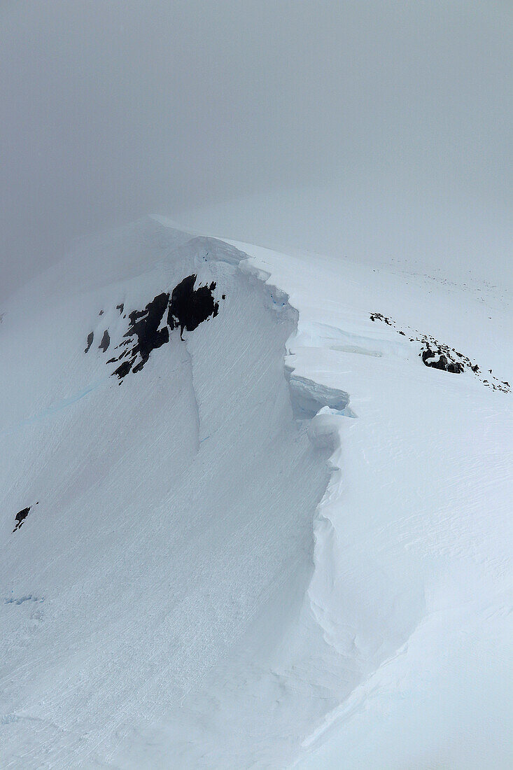 Antarctic; Antarctic Peninsula at Orne Harbour; Snowfall and bad weather in the Antarctic summer