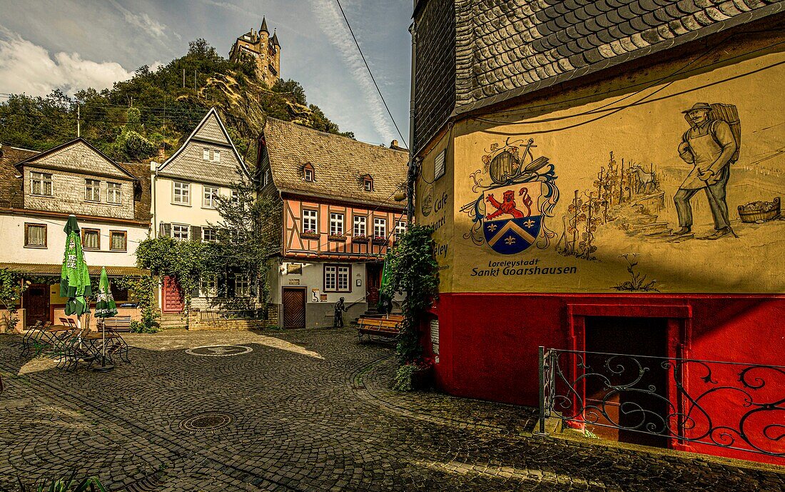 Facade painting and town houses in the old town of St. Goarshausen, Upper Middle Rhine Valley, Rhineland-Palatinate, Germany